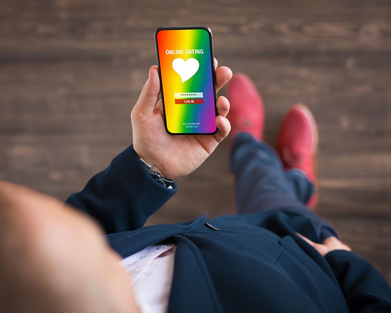 Introverted gay man using dating app to find a date